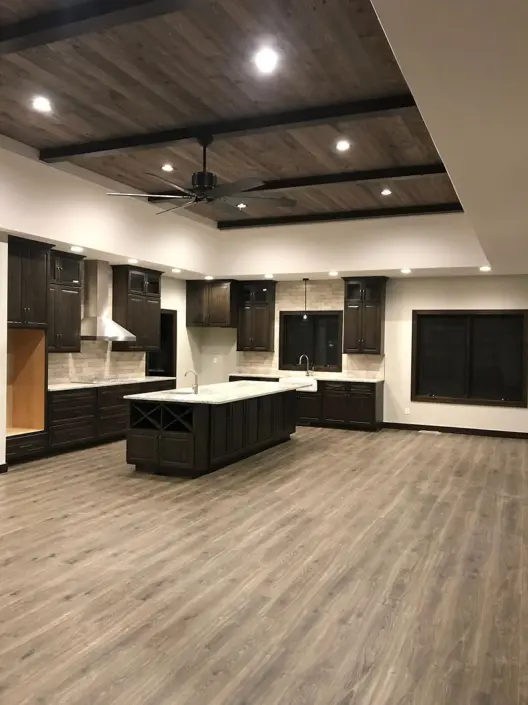 Custom Redi-Built home with gray siding, stone accents and covered front porch in Watertown, SD