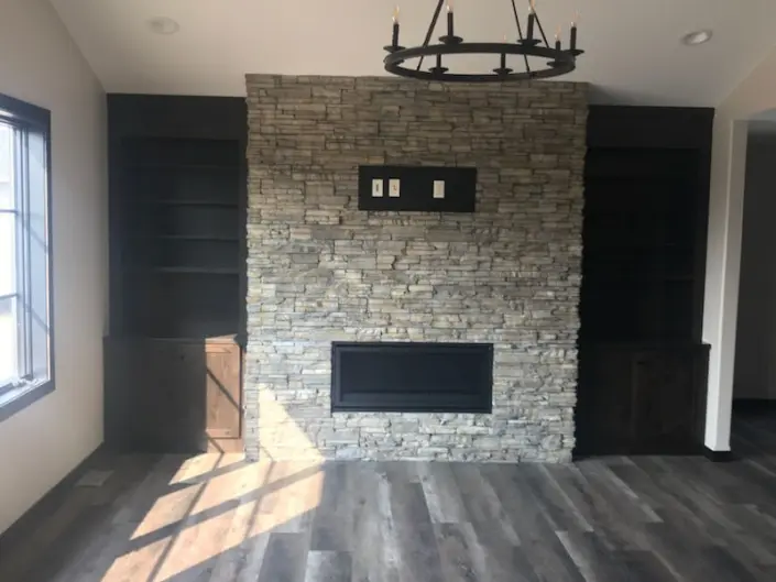 Custom Redi-Built home with gray siding and covered front porch in Watertown, SD